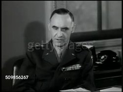 1946: AMERICAN ZONE, GERMANY: American flag on pole. U.S. General Lucius D. Clay (1897-1978) in office SOT saying U.S. Zone has establishing local, elected government, believe democracy can be established, Germany must be interested in self-government Instructional Video