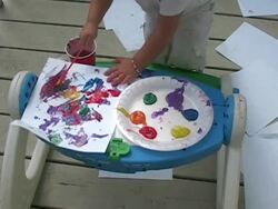 Child painting picture. Stock Footage
