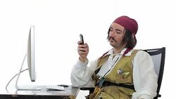Internet pirate browsing his smartphone. Stock Footage
