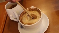 Fill sugar in a cup of coffee Stock Footage