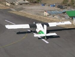 MS TS Prop Aircraft Pilatus Porter taking off on small Runway of Lukla Airport near Khumbu Valley / Lukla, Khumbu Region, Nepal Stock Footage