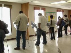 MS, People casting their votes at electronic voting machines, Toledo, Ohio, USA Stock Footage