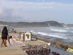 WS Shot of women looking at curios on promenade at Orient Beach in Eastern Cape / Eastern Cape, South Africa Stock Footage