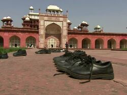  Shoes in front of Tomb of Akbar the Great / Sikandra, Agra, India Stock Footage