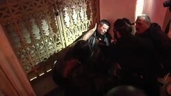 Scuffles between demonstrators and riot police as protesters call for government to step down News Clip