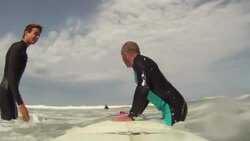 CLEAN : Near blind Frenchman rides the waves News Clip