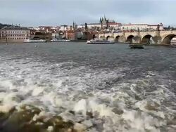 VLTAVA RIVER CHARLES BRIDGE AND ST VITUS CATHEDRAL Stock Footage
