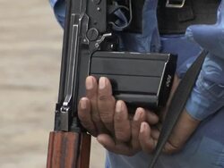 12/3/2008 CU Policeman with machine gun, Taj Hotel, Mumbai, India Stock Footage