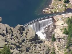 MS AERIAL Shot of dam near mountain / Montana, United States Stock Footage