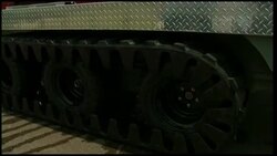 Rescue workers use amphibious vehicle to patrol flood hit neighbourhoods Instructional Video