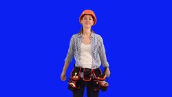 Builder pretty girl fooling around and hamming Stock Footage