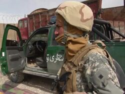 CU PAN Soldiers discussing / Mausa Qala, Helmand Province, Afghanistan. Stock Footage