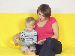 Family reading a book Stock Footage
