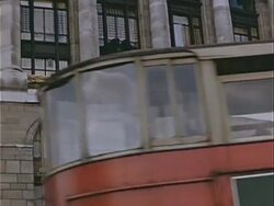 1939 Medium shot Double-decker bus driving past sandbags piled in heap outside building during war preparations / London, England  Stock Footage