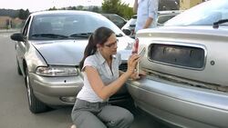 MS DS Drivers Documenting A Car Accident Stock Footage