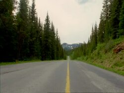 WA empty highway through mountains and forest, Canada Stock Footage