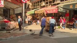 In Hong Kong - a shop owner's best friend is the cat News Clip