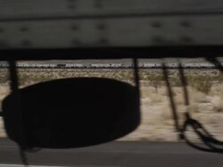 Dolly shot along truck and train Stock Footage