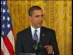 Obama says insurance giant can't justify bonuses; vox pops, analyst News Clip