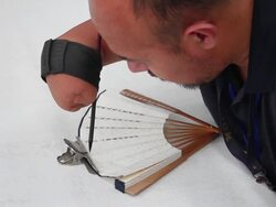 CU MS Disabled writing Chinese calligraphy on fan/xian,shaanxi,China Stock Footage