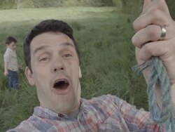 Adult Male On A Rope Swing Finding His Inner Child Stock Footage