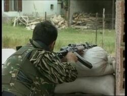 Macedonians re-take villages held by Albanian rebels. News Clip