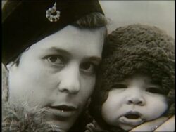 B/W 1900's close up of immigrant woman holding baby Stock Footage