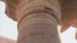 Engravings cover a pillar at ancient ruins in Karnak, Egypt. Stock Footage