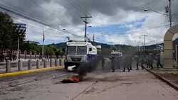 CLEAN : Students clash with police in Honduras News Clip
