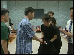 WRAP Memorial, relatives, demo in Seoul, Afghan reax ADDS parents News Clip