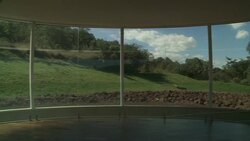 The  Sonic Pavilion frames lush lawns and woodlands in Belo Horizonte, Brazil. Stock Footage