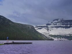 Walking on Boat Dock in Rocky Mountains Stock Footage