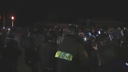 More than a dozen people protesting a grand jury's decision not to indict the police officer who fatally shot 18-year-old Michael Brown were arrested late Friday night outside of the police department in Ferguson, Missouri. (Nov. 28) Instructional Video