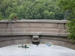 MS Two young girls having fun and riding bicycles in urban area near lake and inside park / Minneapolis, Minnesota, United States Stock Footage