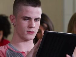 High School students using tablet PCin a classroom. Stock Footage