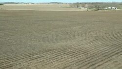 Spring Cornfield and Planting Panning Aerial Crane Shot Stock Footage