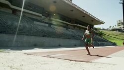 Female long jumper running and jumping Stock Footage