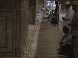 WS Men Praying at Night Jama Masjid Mosque / India Stock Footage