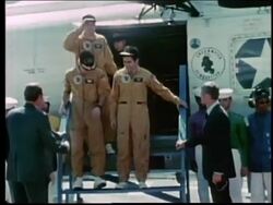 Astronauts waving as they get off helicopter / Apollo 17 Stock Footage