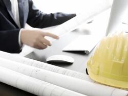 Businessman working on blueprints Stock Footage