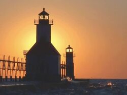 Sun Setting Behind Lighthouse Part 11 Stock Footage