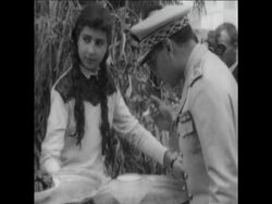 SYND 10-07-71 KING HASSAN II OF MOROCCO WITH HIS PEOPLE, INSPECTING TROOPS AND VISITING TOWN News Clip