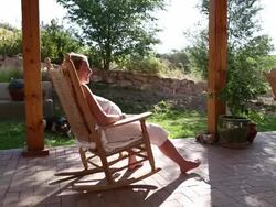 WS View of pregnant woman relaxing on porchy / Phoenix, Arizona, United States Stock Footage