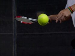 SLO MO, CU, Man's hand hitting tennis ball with racket, Santa Barbara, California, USA Stock Footage