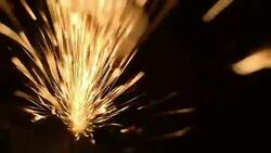 Sparks fly from industrial Stock Footage