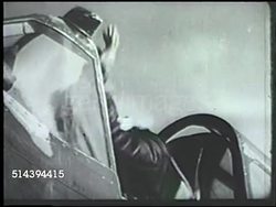 1943: ALEUTIAN ISLANDS CAMPAIGN:  EXT VS U.S. officers briefing pilots, pilots boarding aircrafts, including Curtiss P-40 Warhawk fighter plane & Consolidated B-24 Liberator heavy bomber airplane on air base in Amchitka. WWII, Pacific Front Instructional Video