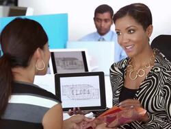 MS PAN Interior Designer and Architect Discussing Building Plans on Tablet Computer / Richmond, Virginia, USA Stock Footage