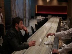 MS Bartender serving two young men in upscale bar / Minneapolis, Minnesota, United States Stock Footage