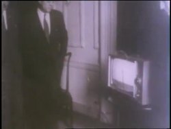 U.S. President John F. Kennedy and U.S. Vice President Lyndon B. Johnson watch the launch of the Mercury Project Freedom 7 on television. News Clip