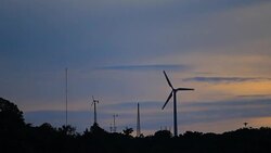 Wind turbine silhouette Stock Footage